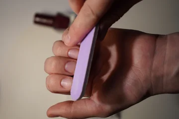 Canvas schilderij Nagelstudio women's manicure close up  © Bohdana