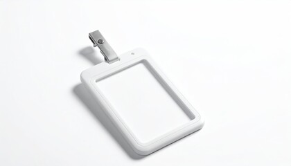 White ID badge holder with clip on a bright white surface