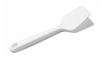 White silicone spatula lying angled, isolated on white
