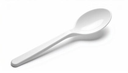 Glossy, white, plastic spoon laying diagonally