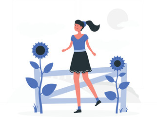 Young woman with ponytail walking between sunflowers in a field with a fence girl