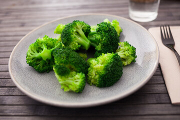 Fototapeta premium diet food. steamed broccoli on plate