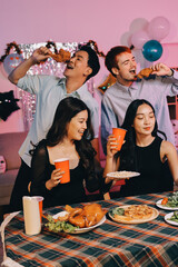 Diversity, dinner and group of people toast celebration together at party. Friends, happy and celebrate with food, wine and friendship for love, support and cheers champagne at business function