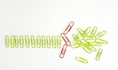 business concept,disruption,thinking outside the box,transformation,innovation,flat lay with paper clips,free copy space