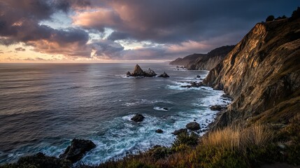 Dramatic coastal cliffs meet the stormy ocean under a breathtaking sunset sky, perfect for travel inspiration and nature photography collections