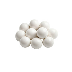 Close-up of glossy, white spheres clustered on a stark black background