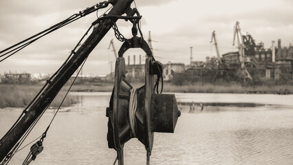 sunken and broken ships in a destroyed port in Ukraine during the war