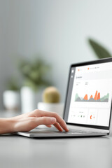 Modern workspace with laptop open to dashboard UI, user hand swiping through holographic analytics panel