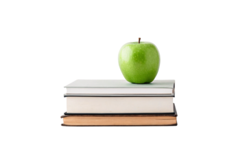 Green apple on three stacked books, minimalist educational still life composition arrangement, isolated on a transparent background
