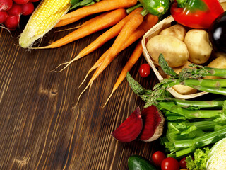 Fresh Mixed Vegetables and Salads on wooden Background