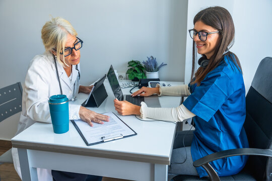 Two doctors collaborating on medical research using technology - Powered by Adobe