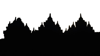 Ancient temple silhouettes against a bright sky