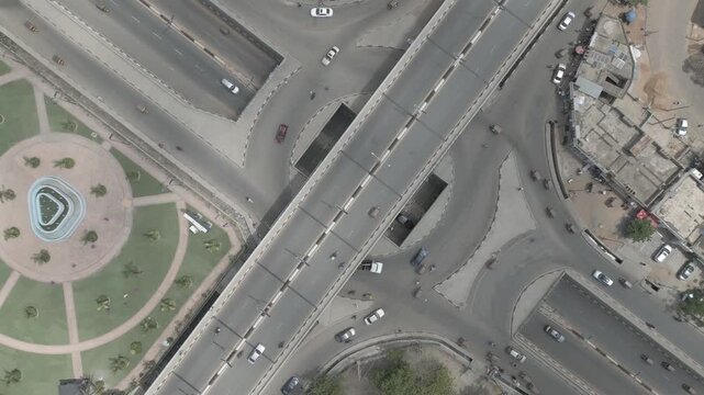 Aerial view of RMK Bridge with vehicles moving across the intersection, highlighting the urban landscape, Kano, Kano, Nigeria.