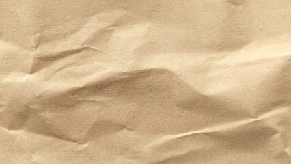 Old kraft brown paper texture background with crumpled surface and copy space. Recycle brown paper with detailed wrinkled pattern. Crumpled old brown vintage paper for background.