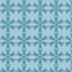 Seamless repeating snowflake pattern on blue background. Festive winter and Christmas texture ideal for wrapping paper, textiles, gift tags, holiday backgrounds, greeting cards, and seasonal designs.