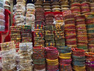 collection of traditional Indian bangles, bangles of colorful and different materials on sale store 