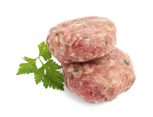 Fresh raw meat patties and parsley isolated on white