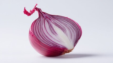 Fresh red onion cut in half showing beautiful purple and white layered rings against clean white background, perfect for cooking and kitchen concepts