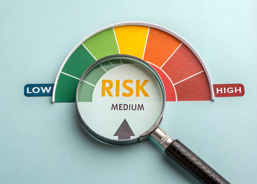 Risk Assessment Gauge with Magnifying Glass: Low, Medium, High Levels