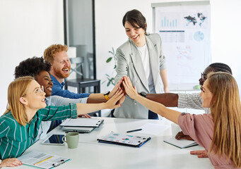 Obraz premium Portrait of a smart young businesspeople during meeting in the office or classroom. Teamwork, unity, diversity and partnership business concept or education and student concept