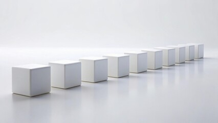 A row of pristine white cubic display stands on a seamless white surface, ideal for showcasing products or concepts in a minimalist setting.