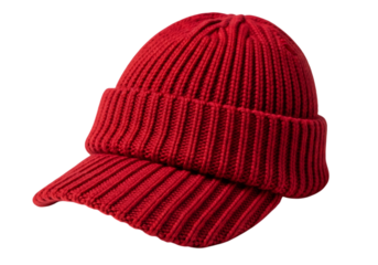 A vibrant red knitted beanie with a folded brim and a short brimmed visor isolated on transparent background