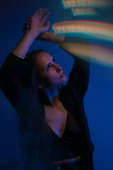 Moody Neon Portrait of Woman with Creative Lighting and Motion Blur