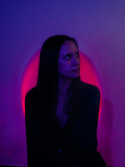 Moody Neon Portrait of Woman with Creative Lighting and Motion Blur