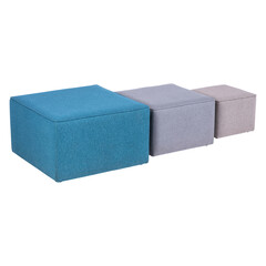 Set of three upholstered lounge footstools in blue, grey, and beige fabric. Minimalist square ottomans arranged in size order, showcasing modern home décor and soft textile texture