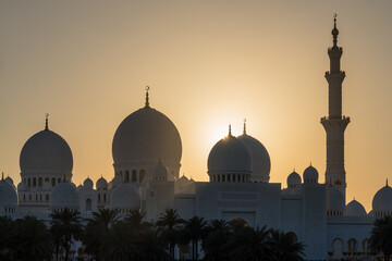 Golden hour illuminates grand mosque domes and minarets © Jeroen Kleiberg