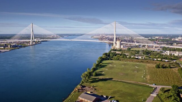Drone glides over Gordie Howe International Bridge en route to the industrial area along the Detroit River.