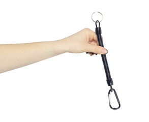 Retractor with carabiner and cable in hand, outstretched arm with retractable carabiner with cable for keys, isolated from background