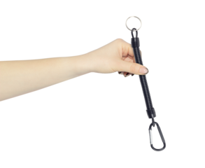 Retractor with carabiner and cable in hand, outstretched arm with retractable carabiner with cable for keys, isolated from background