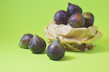 fresh figs on a green background	