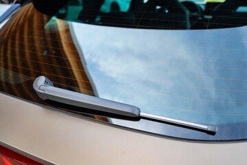 New car rear windshield wiper blade. Close up shot, exterior view, no people