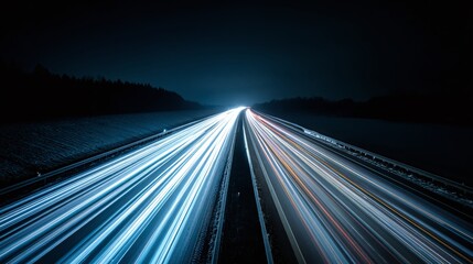 Obraz premium Night highway streaks with light trails, a visual symphony of motion and speed. Long exposure captures the essence of modern transportation in darkness.