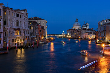 Grand Canal with Basilica di Santa Maria della Salute in Venice, Italy. Night view of Venice Grand Canal. Architecture and landmarks of Venice. Venice postcard