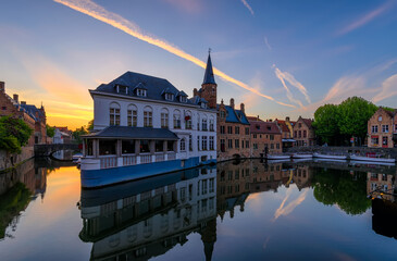 Typical view of the historic city center of Bruges (Brugge), West Flanders province, Belgium. Sunset cityscape of Bruges.