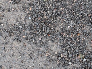 Pile of grey broken gravel stone background 