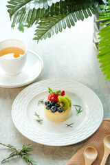 A delicious fruit tart and tea set for refreshment
