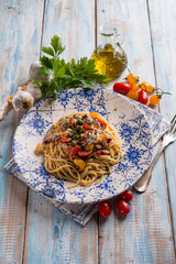 spaghetti with fresch anchovy  tomato and capers