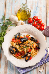 spaghetti with mussels tomatoes and parsley