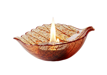 Decorative leaf shaped oil lamp with a lit flame isolated on transparent background