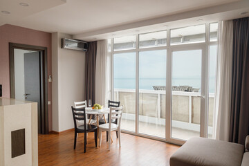 Experience a Modern Apartment that Boasts a Stunning Ocean View and a Cozy Interior Design