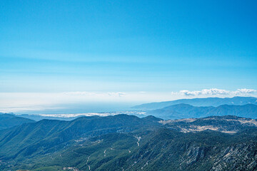 The scenic views of the Tahtalı Montain (Tahtalı Dağı), also known as Lycian Olympus with a height of 2365 meters near Kemer, in Antalya, Turkey.