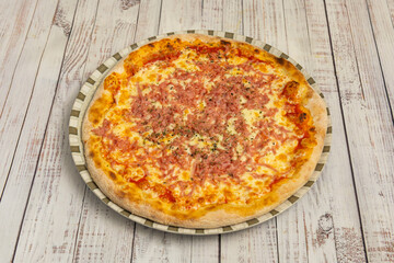 Beef pizza with braised beef, crispy onions, portobello mushrooms, and demi-glace sauce