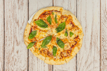 Four cheese pizza with mozzarella, Gorgonzola, Parmesan, and fontina melted in perfect harmony on a thin crust