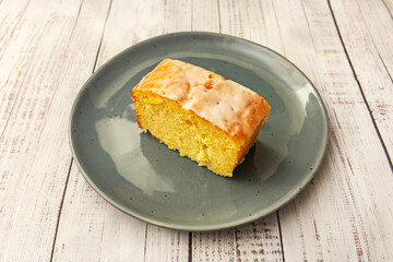 Orange sponge cake with an intense citrus aroma, soaked in natural orange syrup and decorated with thin strips of candied orange peel.