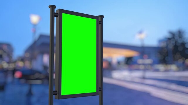 Vertical green screen billboard standing on a sidewalk with a city street in the background showing different times of day and night