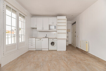 Modern kitchen with an integrated home automation system, lighting control, and appliances controlled from a smartphone